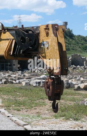 Old rusty boom and crane hook close-up Stock Photo