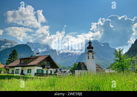 Place Lofer with church and Loferer Steinberge in the background, Lofer, Route of the Gorges, Salzburg, Austria Stock Photo