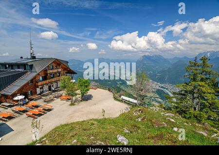 Several people are sitting at the Pendlinghaus with the Inn Valley in the background, Brandenberg Alps, Tyrol, Austria Stock Photo