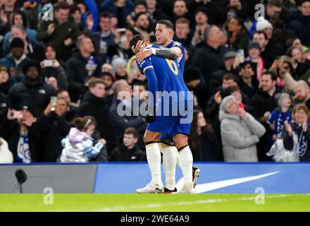 Chelsea's Enzo Fernandez (right) celebrates scoring their side's second goal of the game with team-mate Thiago Silva during the Carabao Cup semi final second leg match at Stamford Stadium, London. Picture date: Tuesday January 23, 2024. Stock Photo