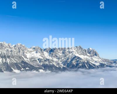 Austria, Thick fog in front of Kaiser Mountains Stock Photo