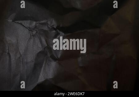 black wrinkled paper texture, concept bacground Stock Photo