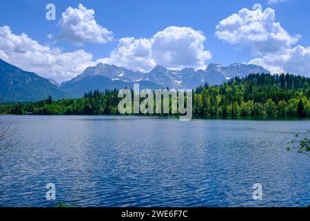 Germany, Bavaria, Barmsee lake in summer with Karwendel range in background Stock Photo