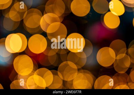 Orange glowing defocused Christmas lights Stock Photo