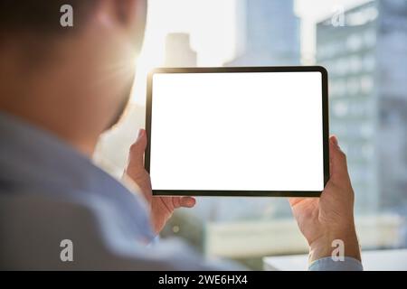 Businessman holding tablet PC with blank screen Stock Photo