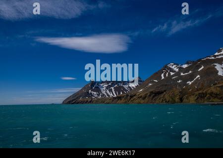Fortuna Bay, SGI, landscape, mountains, snow, covered peaks,sunny day in Spring Stock Photo