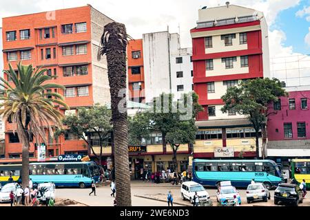 View of Moi Avenue Street in Nairobi City with public vehicles and people on a busy day in Kenya Stock Photo