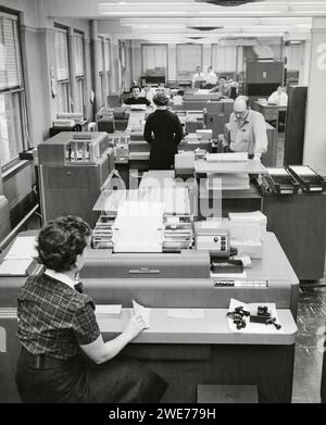 Office workers entering data Stock Photo