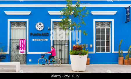 Cyclist in the historic center of Merida, Yucatan, Mexico Stock Photo