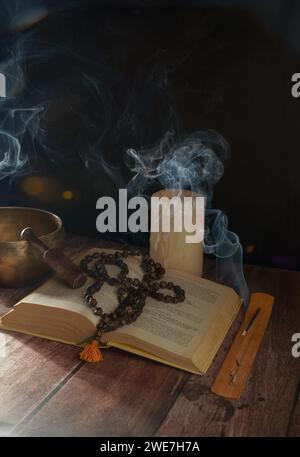 open bhagabad gita sacred book of india with a japamala ,prayer beads ...