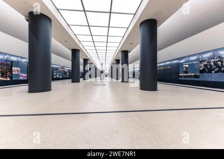 Modern and bright interior design of a building with a long corridor and rectangular columns, Brandenburg Gate, Berlin, Germany Stock Photo