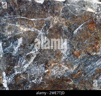 Contrast stone design with white lines on, textured rustic surface background. Stock Photo