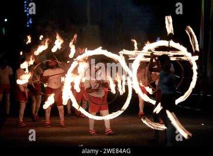 Colombo, Sri Lanka. 23rd Jan, 2024. Fire acrobats perform at a celebration during the Duruthu Perahera festival at a temple in Kelaniya, Sri Lanka, on Jan. 23, 2024. Credit: Ajith Perera/Xinhua/Alamy Live News Stock Photo