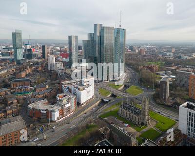 Aerial image of Manchester, UK looking towards Castlefield, Deansgate Square, The Blade, Crown St, Beetham Tower and Manchester city centre Stock Photo