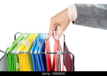 Closeup view of businessman searching file folder on the file organizer isolated over a white background Stock Photo