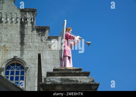 Statue on the roof of the Church of The Monastery of the Holy Eucharist, also known as the Our Lady of Lindogon Shrine and commonly known as the Simal Stock Photo