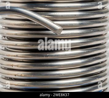 Close-up of a reel of solder used for plumbing Stock Photo