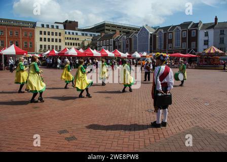 Morris Dancers putting on a display at a convention, Market Square, Northampton, UK Stock Photo