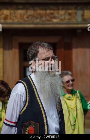 Morris Dancers putting on a display at a convention, Market Square, Northampton, UK; male Morris dancer with long grey beard Stock Photo