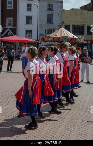 Morris Dancers putting on a display at a convention, Market Square, Northampton, UK Stock Photo