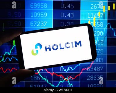 Konskie, Poland - January 23, 2024: Holcim company logo displayed on mobile phone screen Stock Photo