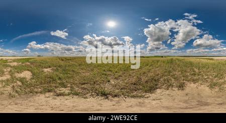 360 degree panoramic view of spherical 360 hdri panorama among dry grass farming field with clouds on blue sky in equirectangular seamless projection, use as sky dome replacement,