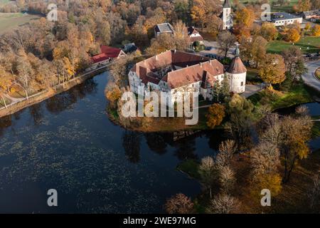 Jaunpils castle was built in 1301. as Livonia Order fortress. Latvia, aerial drone view Stock Photo