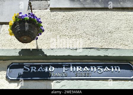 Street sign in Scots Gaelic and English in downtown Stornoway, Isle of Lewis, Scotland Stock Photo