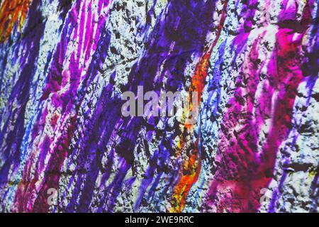 Abstract background with multicolored spots of paint on the wall Stock Photo