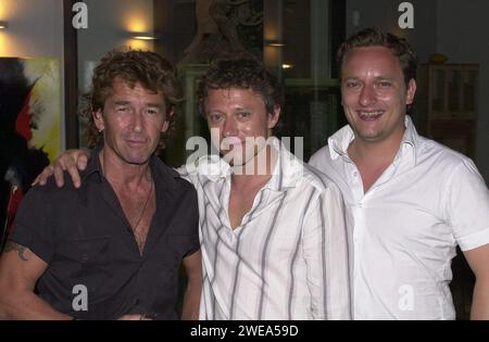 Peter Maffay, Axel Pape ('Die Wache') und dessen Bruder Lars Pape ('Balko') bei der after race party, Mallorca Spanien 2003. Stock Photo