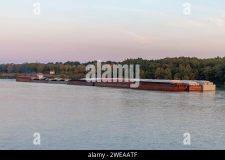 Tug boat pushing multiple barges on the Tennessee River near Savannah, Tennessee Stock Photo