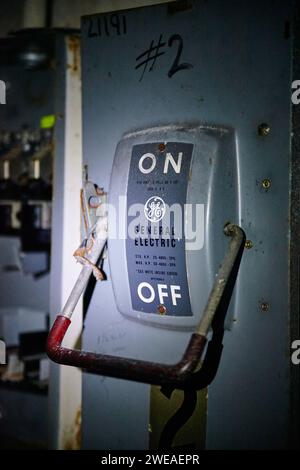 Industrial Power Switch in Abandoned Factory - Close-up View Stock Photo
