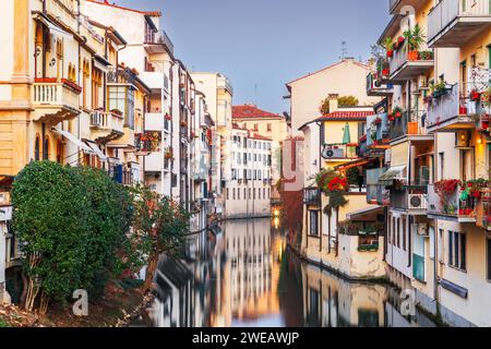 Padua, Italy canals and buildings at dusk. Stock Photo