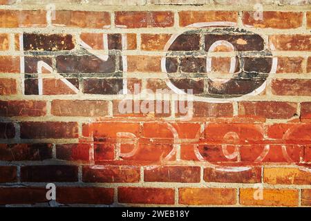 Vintage Brick Wall Texture with Faded Paint Close-Up Stock Photo