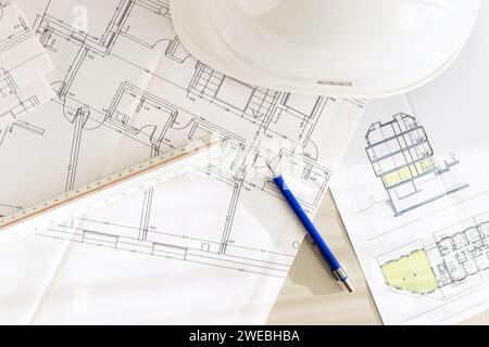 Architecture plans and architect supplies on desk Flat lay Stock Photo