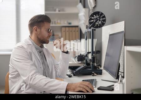 3D Printing Engineer Working on Computer Stock Photo