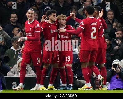 Liverpool's Luis Diaz (second left) celebrates scoring their side's first goal of the game during the Carabao Cup semi final second leg match at Craven Cottage, London. Picture date: Wednesday January 24, 2024. Stock Photo