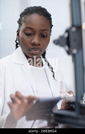 Working Female 3D Printer Engineer Stock Photo