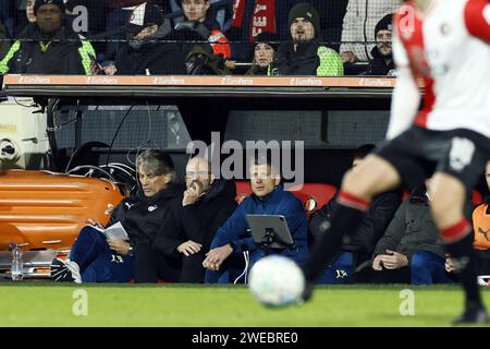 ROTTERDAM - (l-r) PSV Eindhoven assistant coach Rob Maas, PSV Eindhoven coach Peter Bosz, PSV Eindhoven assistant coach Stijn Schaars during the TOTO KNVB Cup match between Feyenoord and PSV at Feyenoord Stadium de Kuip on January 24, 2024 in Rotterdam, Netherlands. ANP KOEN VAN WEEL Stock Photo