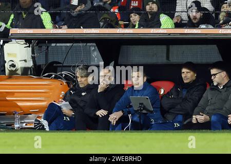 ROTTERDAM - (l-r) PSV Eindhoven assistant coach Rob Maas, PSV Eindhoven coach Peter Bosz, PSV Eindhoven assistant coach Stijn Schaars during the TOTO KNVB Cup match between Feyenoord and PSV at Feyenoord Stadium de Kuip on January 24, 2024 in Rotterdam, Netherlands. ANP KOEN VAN WEEL Stock Photo