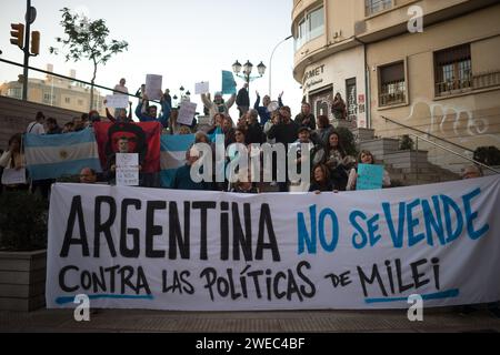 Malaga, Spain. 24th Jan, 2024. A group of protesters hold a large banner in support of Argentina as they take part in a protest against the politics of Argentine President Javier Milei. Argentinian residents in Malaga have joined a worldwide protest against the economic measures taken by the Argentinian government, led by Javier Milei. Argentina's main trade unions have called a general strike in the country to protest against the government's austerity measures. (Credit Image: © Jesus Merida/SOPA Images via ZUMA Press Wire) EDITORIAL USAGE ONLY! Not for Commercial USAGE! Stock Photo