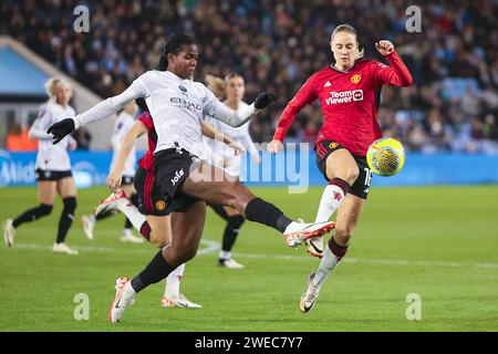 City's Khadija Shaw battles with United's Lisa Naalsund during the THE FA Women's League Cup match between Manchester City and Manchester United at the Etihad Stadium, Manchester on Wednesday 24th January 2024. (Photo: Chris Donnelly | MI News) Credit: MI News & Sport /Alamy Live News Stock Photo