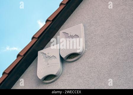 Nesting aids for bats on a house wall, Germany Stock Photo