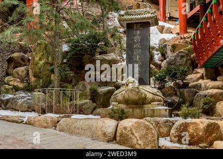 Stele with Chinese writing on stone carved turtle plinth at Guinsa temple in South Korea Stock Photo