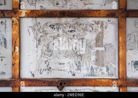 Old rusty advertising board background Stock Photo