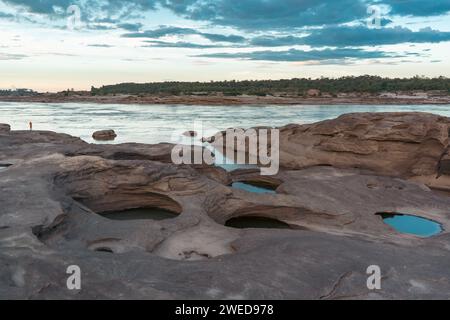 Sam Phan Bok is a group of sandstone in the Mekong River, in Ubon Ratchathani, Thailand Stock Photo