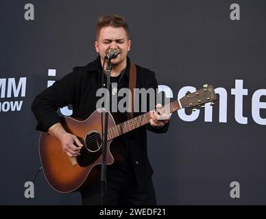 Anaheim, USA. 24th Jan, 2024. Hunter Hayes, playing a Martin GPCE Inception Maple guitar during the NAMM Show Global Media Day held at the Anaheim Convention Center on January 24, 2024 in Anaheim, CA. © Tammie Arroyo/AFF-USA.com Credit: AFF/Alamy Live News Stock Photo