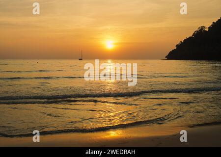 Closeup sea sand beach. Panoramic beach landscape. Inspire tropical beach seascape horizon. Orange and golden sunset sky calmness tranquil relaxing su Stock Photo