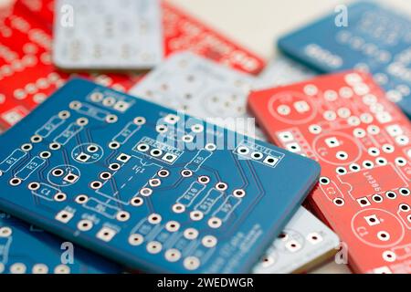 Set of electronic circuit pcb of various colors, shallow depth of field Stock Photo