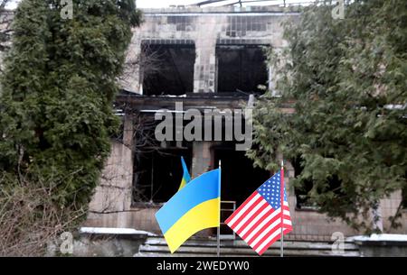 KYIV REGIN, UKRAINE - JANUARY 24, 2024 - Table flags of Ukraine and USA are seen during the signing ceremony of the Protocol for Cooperation in the Reconstruction of the Borodianka District Court in Kyiv region, destroyed by Russian shelling, Borodianka, Kyiv region, north-central Ukraine. Stock Photo